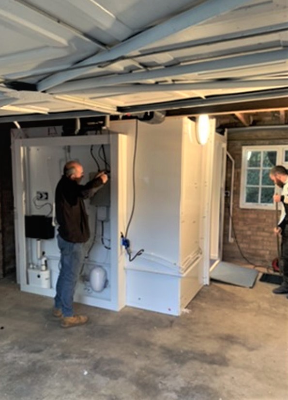 Photo of WashPod installed in a garage