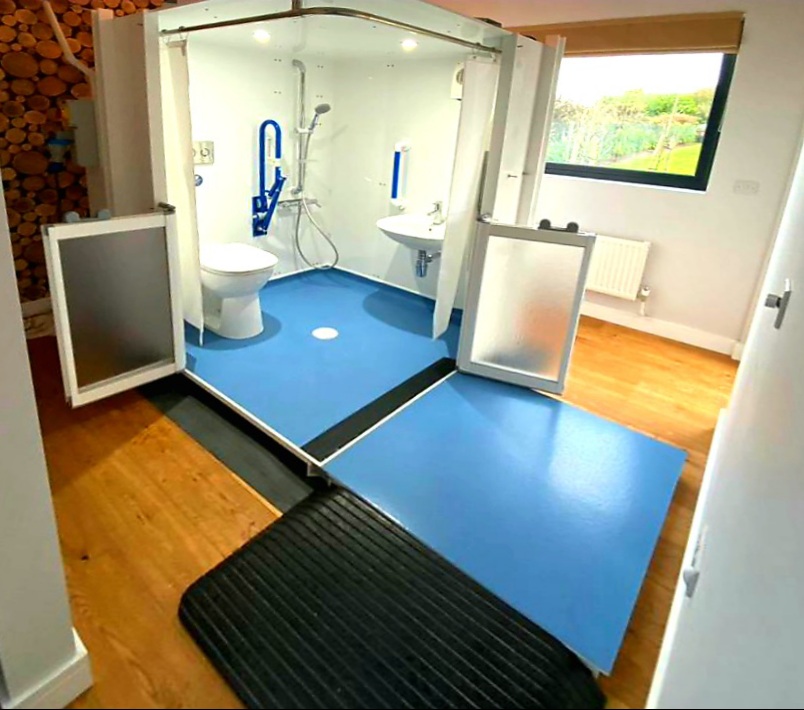 Photo of an internal compact WashPod temporary disabled wetroom