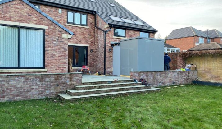 Photo showing the External Compact WashPod installed on the back of a house in Rotherham
