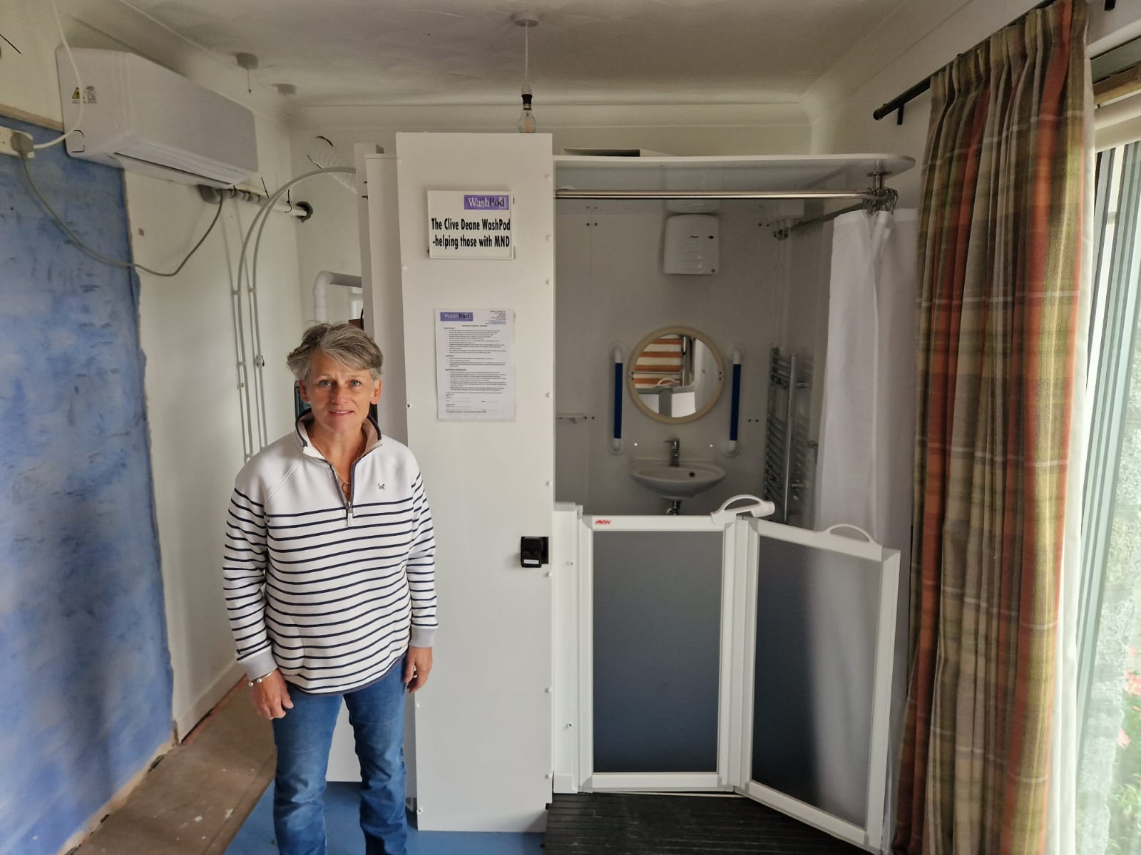 Jay Deane with the WashPod she has donated