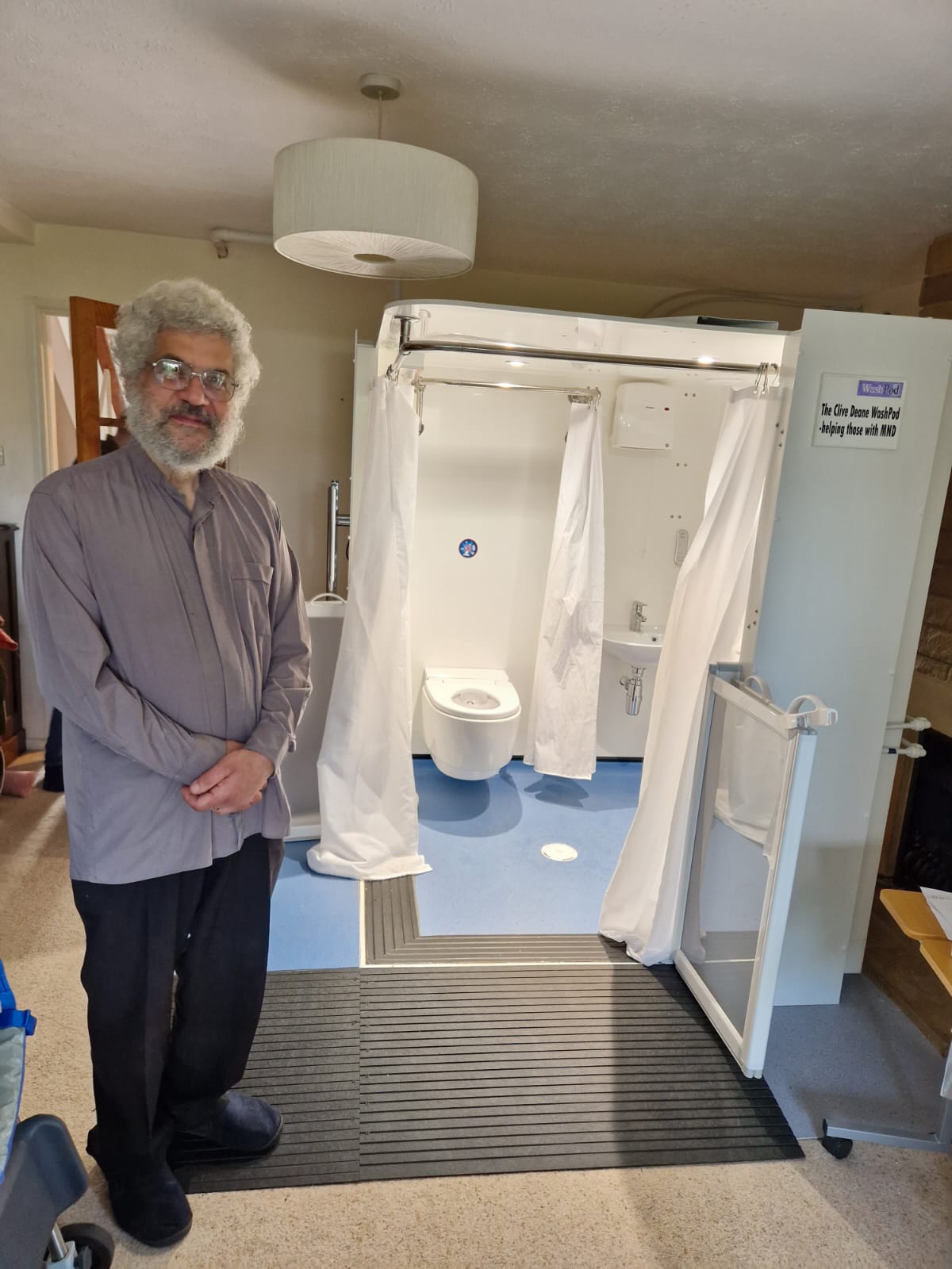 Photo of Berj Topalian with his wife's WashPod