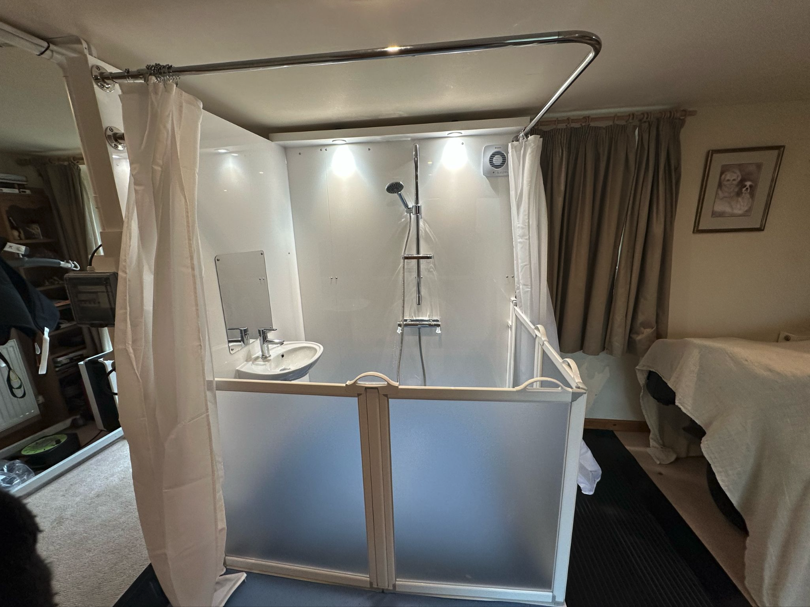 An internal Mini WashPod in a bedroom